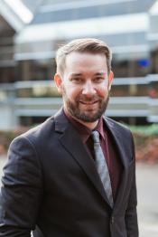 Commissioner August Peterson